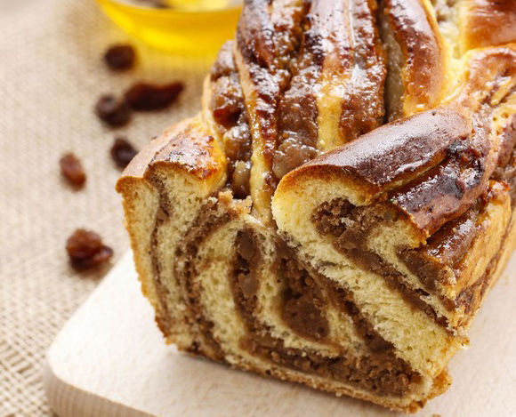 Cake filled with poppy seed and jam. Festive dessert