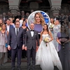 Ministrul Finanțelor și soția, ședință foto la Palatul Șuter. Nașa de cununie a mirilor a atras privirile tuturor!