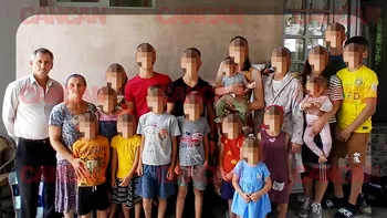 Georgiana și Iosif Văcaru cresc 20 de copii într-o comună din Argeș. Povestea impresionantă a celei mai numeroase familii din România