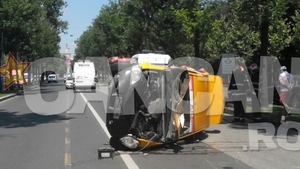 Accident grav in centrul Capitalei dupa ce doua masini s-au rasturnat. Afla ce s-a intamplat