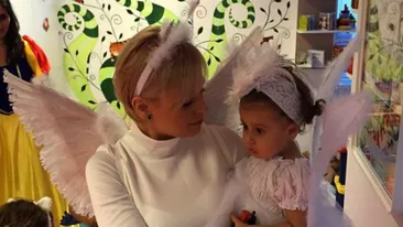 Adorabil! Cum s-au fotografiat Misha și fetița ei în prag de sărbători