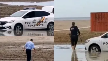 Ei sunt Stan şi Bran din Poliția Română! Unul şi-a suflecat pantalonii ca să poată să scoată maşina împotmolită pe plajă, iar celălalt... VIDEO ireal