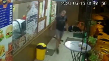 Imagini incredibile în Filiași. Un tânăr a fost snopit în bătaie în fața unui fast-food și lăsat să zacă acolo. Vânzătoarele au dispărut când a început conflictul