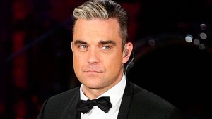 Cântăreţul Robbie Williams a devenit din nou tată. Sotia lui a nascut un baietel!