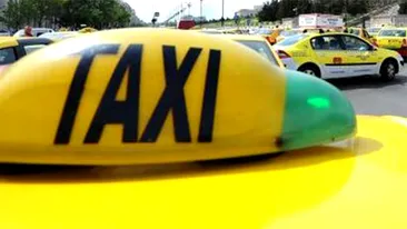 Un taximetrist nervos a luat un poliţist pe capota maşinii, pentru că i-a făcut semn să oprească!