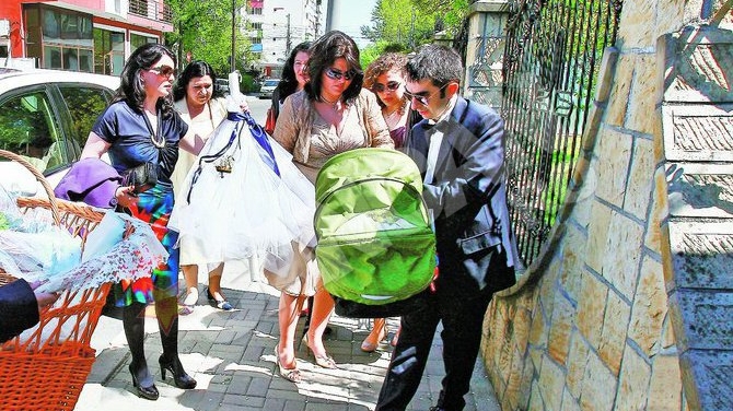 Carcotasul Gainusa si-a botezat baiatul intr-o discretie totala