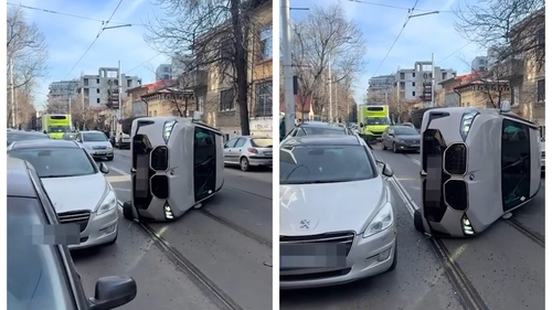 Accident în Sectorul 2 al Capitalei! O mașină s-a răsturnat pe linia de tramvai