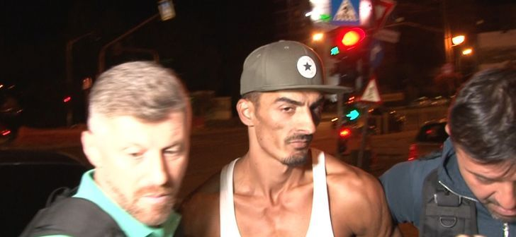 Primele imagini cu criminalul din Timișoara! Cosmin Titiș, încătușat după 3 ore de la uciderea iubitei sale, Maria Karina