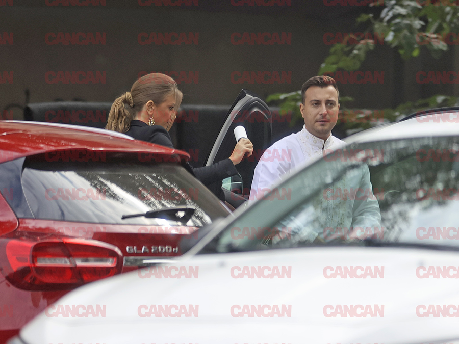 Codruța Filip îi curărță cămașa lui Valentin Sanfira