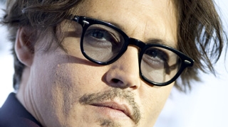 Johnny Depp a fost alcoolic din cauza faimei