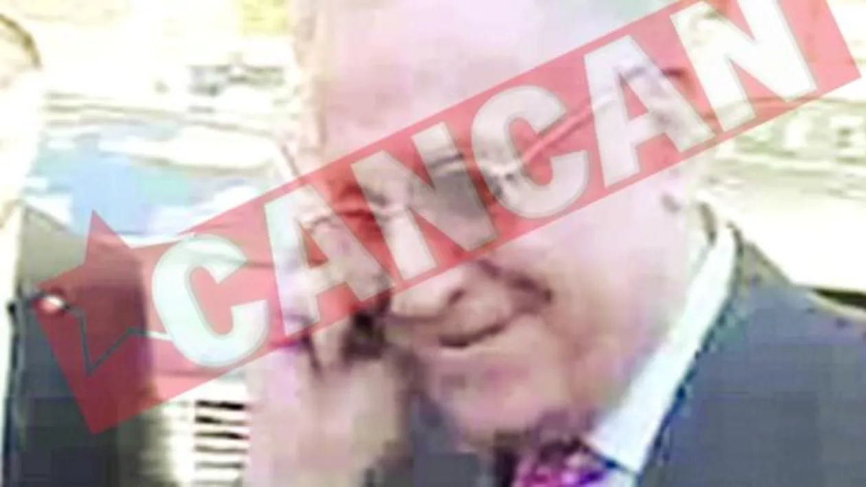 Ion Iliescu vorbeste la telefon in timp ce da interviuri