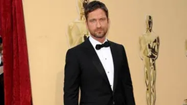 Posh l-a scos din minti pe Gerard Butler