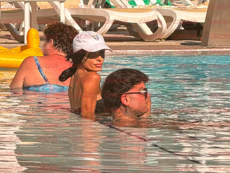 George cu Bambolina lui la piscină