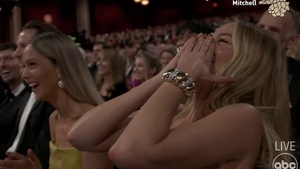 Cum a reacționat Margot Robbie când l-a văzut pe John Cena dezbrăcat pe scenă la Gala Premiilor Oscar 2024