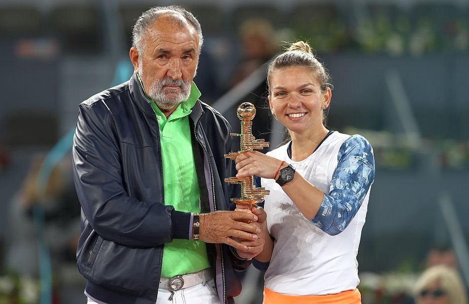 MADRID, SPAIN - MAY 13:  Simona Halep of Romania and Ion Tiriac with the winners trophy after she defeated Kristina Mladenovic of France in the final during day eight of the Mutua Madrid Open tennis at La Caja Magica on May 13, 2017 in Madrid, Spain.  (Photo by Julian Finney/Getty Images)