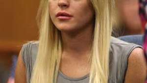 Lindsay Lohan va petrece Ziua Recunostintei doar cu tatal ei