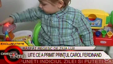 VIDEO Printul Carol a primit cadou un scaun muzical de la nasa lui, Maria Basescu, pe care a servit-o cu ciocolata de pe covor!