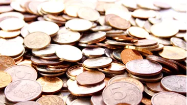 PROTEST CU GREUTATE! Un oradean a platit impozitul pe masina cu 40 de kilograme de monede!