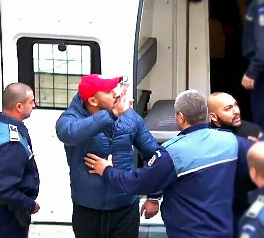 Lupu din Nucet şi Dani Mocanu, când au fost duşi la tribunal