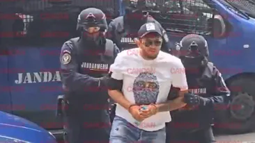 Imagini fabuloase! Fiul lui Emi Pian și iubita, aduși în cătușe la audieri + Bolidul interlopului, ridicat de autorități
