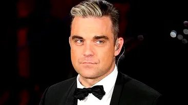 Cântăreţul Robbie Williams a devenit din nou tată. Sotia lui a nascut un baietel!