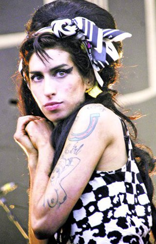 Comportament. Amy Winehouse parea adesea speriata si pierduta in lumea ei