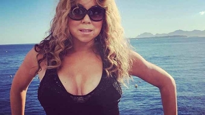 Nu mai există niciun dubiu! MARIAH CAREY se iubeşte cu dansatorul ei şi are o burtică ”suspectă”