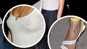 Rihanna, aparitie de neuitat: in maiou transparent, cu sfarcurile la vedere, cu o vanataie pe brat si incaltata in sandale facute din metrul de croitorie!