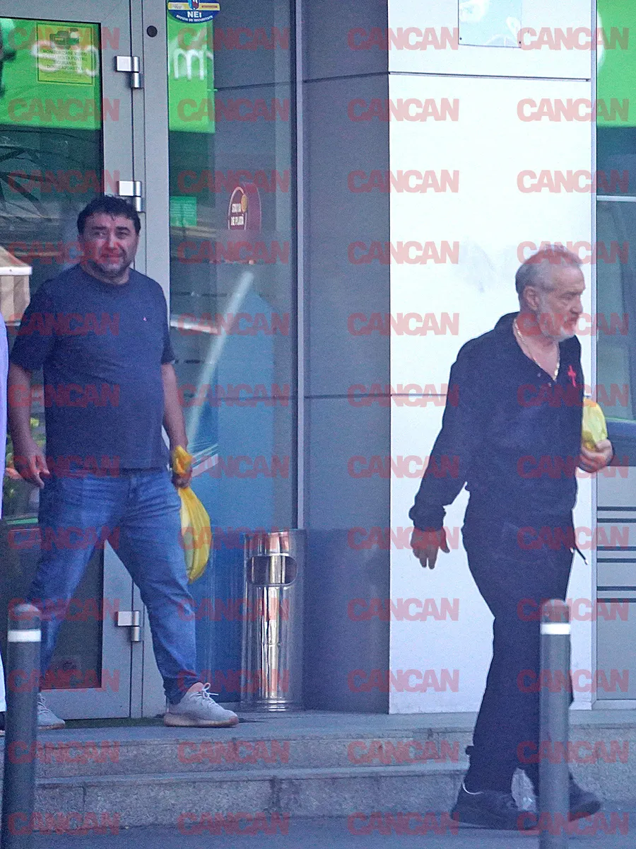 Ies din bancă după 30 de minute cu pungile pline cu bani