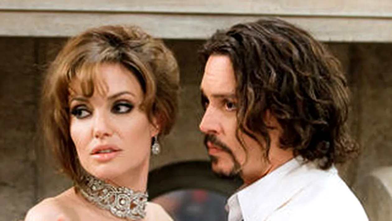 Angelina Jolie, motivul despartirii dintre Johnny Depp si Vanessa Paradis!
