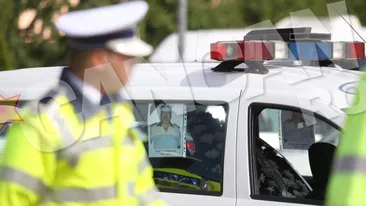 Vaduva “Dulaului”, desfigurata de durere! Lacrimi si onoruri militare la inmormantarea politistului ucis de “Regele Veiozelor”!