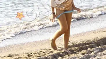 O mai tineti minte pe Leni, blonda care si-a dat jos chilotii in fata lui Piti Jr. la mare? Si-a socat prietenii cu alte poze trasnite si vrea sa devina actrita de telenovele!