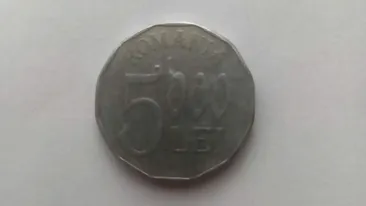 Mai ții minte celebra monedă de 5.000 lei din anul 2002?! Cu ce preț se vinde acum, în martie 2023