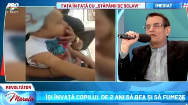 Se intampla in Romania! Un copil de doi ani a fost pus sa fumeze si sa bea bere de tatal sau. TOTUL a fost filmat!