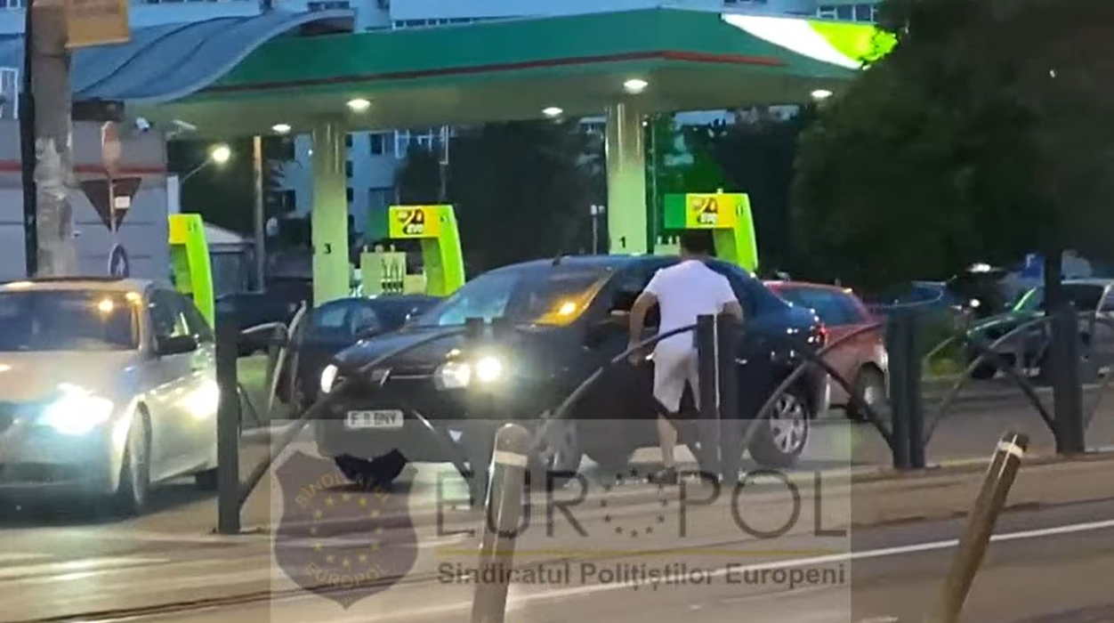 Șoferul unui Logan, bătut în trafic de bărbat care conduce un BMW. Atacatorul s-a năpustit asupra lui cu o crosă de golf, iar iubita a lovit cu picioarele mașina victimei | VIDEO