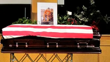 Cainele unui soldat ucis in Afganistan, nedezlipit de cosciugul stapanului