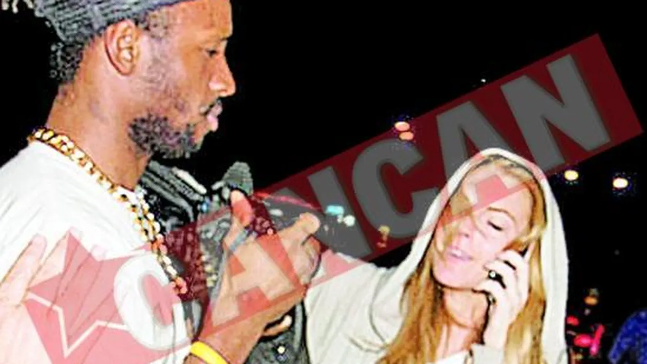 Lindsay a batut un fotograf cu geanta