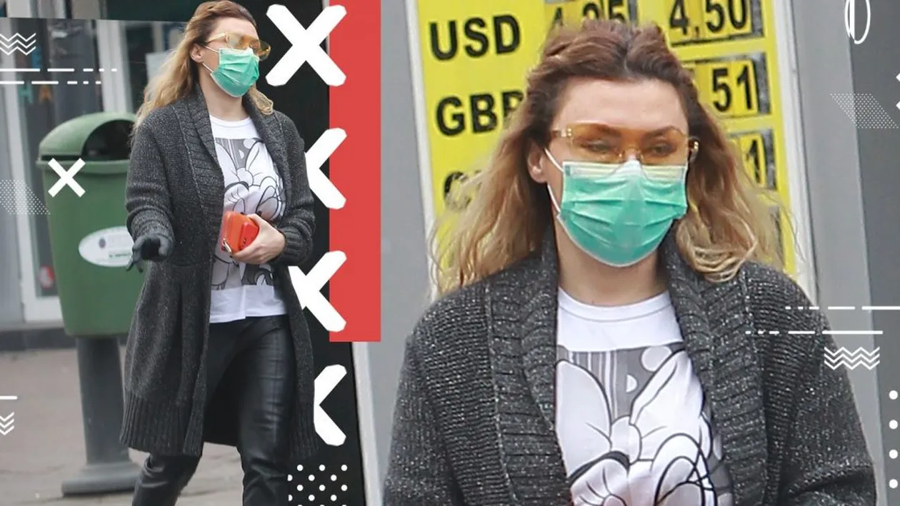 Chiar dacă poartă mască, sexy-dansatoarea nu iese oricum pe stradă. Ochelari portocalii și portofel asortat,  pantaloni de piele și…