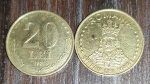 O mai ai acasă? Prețul ireal la care se vinde o monedă de 20 de lei veche de 33 de ani