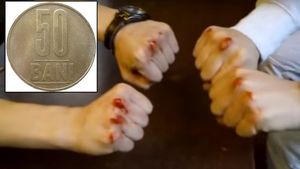 Alertă în România! Un joc sângeros, cu o monedă de 50 de bani, face senzație în rândul elevilor pe Youtube și Tik Tok