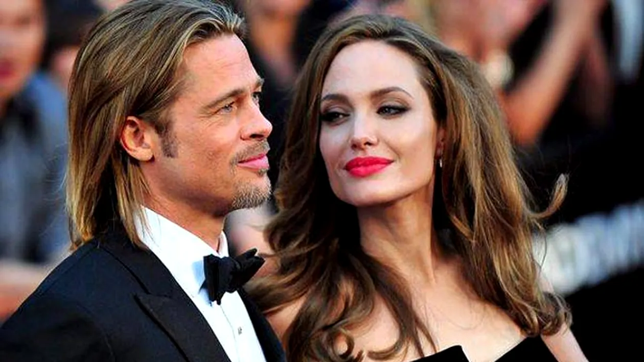 VIDEO Paparazzi i-au dat de gol? Se pare ca Angelina Jolie si Brad Pitt s-au casatorit in secret! Vezi cum a stralucit actrita intr-o rochie superba si ce buchet a avut