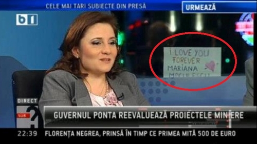Cristi Marin, evacuat de paznici dupa ce a lipit un mesaj de amor pe geamul studioului, la o emisiune live! Vezi declaratia!