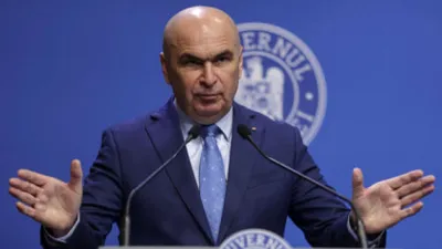 Cum le răspunde premierul Bolojan celor care îl numesc „Ilie Sărăcie”. Anunț despre creșterea taxelor și bugetul partidelor