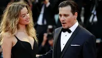 Un nou scandal zguduie Hollywood-ul! După ce a anunţat că divorţează de JOHNNY DEPP după doar 15 luni de căsnicie, AMBER HEARD l-a acuzat de violenţă domestică