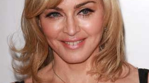 Madonna este hartuita de un fost pompier!