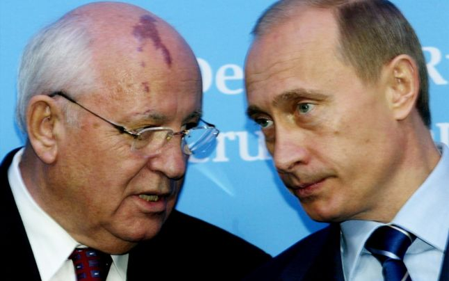 Poză de acum 21 de ani, cu Vladimir Putin! Era spion sub acoperire, în preajma președintelui american Ronald Reagan?