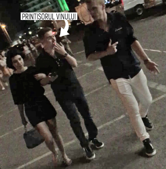 "Prinţişorul vinului" şi iubita lui, alături de unul dintre petrecăreţi