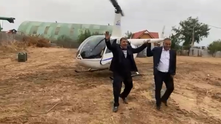 Primarul dintr-o localitate din Dolj, dus la nuntă cu elicopterul. „Barem dacă oi pica, să pic, dă-mă dreacu”