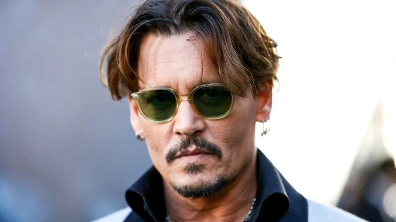 Johnny Depp şi-a dat în judecată fosta soţie şi îi cere daune de 50 de milioane de dolari