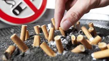 Este oficial! Fumatul a fost interzis in spatii publice! Barurile, cluburile si discotecile mici raman deschise fumatorilor